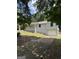 This cozy home offers a multi-car garage, a quaint front porch, and a well-maintained lawn at 276 Appalachee Church Rd, Auburn, GA 30011