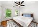 Bright bedroom with large windows, ceiling fan, and hardwood floors at 216 Leyden St, Decatur, GA 30030