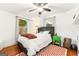 Cozy bedroom with hardwood floors, natural light, and a comfortable queen size bed at 216 Leyden St, Decatur, GA 30030