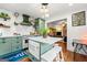 Stylish kitchen with custom cabinets, sleek appliances, and an island with seating at 216 Leyden St, Decatur, GA 30030
