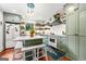 Updated kitchen with modern appliances, custom cabinets, and center island with seating at 216 Leyden St, Decatur, GA 30030