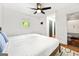 Bright main bedroom with en-suite bathroom and a view of the trees at 216 Leyden St, Decatur, GA 30030