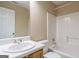 Bathroom featuring a shower and tub combination with vanity at 2375 Lexington Ln, Cumming, GA 30040