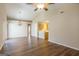 Open-concept space features wood-look flooring, vaulted ceiling, and a view into the kitchen at 2375 Lexington Ln, Cumming, GA 30040