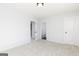 Bright bedroom with carpeted floors with easy access to a private bathroom at 121 Chattahoochee Circle, Locust Grove, GA 30248