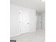 Bright bedroom with neutral carpet and fresh white paint at 121 Chattahoochee Circle, Locust Grove, GA 30248