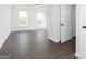 Bright bedroom with hardwood floors, neutral walls, and closet space at 121 Chattahoochee Circle, Locust Grove, GA 30248