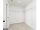 Spacious walk-in closet with carpeted floors and wire shelving units at 121 Chattahoochee Circle, Locust Grove, GA 30248