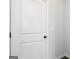 Interior door with black hardware and white trim at 121 Chattahoochee Circle, Locust Grove, GA 30248