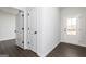 The entryway features wood floors, multiple doors, and white walls at 121 Chattahoochee Circle, Locust Grove, GA 30248