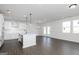 Open-concept kitchen featuring a large island and stainless steel appliances at 121 Chattahoochee Circle, Locust Grove, GA 30248