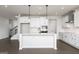 Modern kitchen featuring stainless steel appliances and a large island at 121 Chattahoochee Circle, Locust Grove, GA 30248