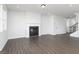 A bright living room with a fireplace at 121 Chattahoochee Circle, Locust Grove, GA 30248