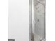 White marble shower with a chrome shower head in a modern designed home at 121 Chattahoochee Circle, Locust Grove, GA 30248