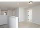 Hallway area with carpet flooring and white trim at 121 Chattahoochee Circle, Locust Grove, GA 30248