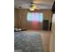 Bedroom features neutral walls, and plush rug to create a cozy atmosphere at 268 Rountree Rd, Riverdale, GA 30274