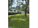 Split level home with lawn and shrubs at 268 Rountree Rd, Riverdale, GA 30274