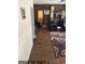 The living room features hard wood floors, an exercise area, dark accent wall, area rug, and natural lighting at 268 Rountree Rd, Riverdale, GA 30274