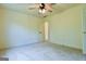 This bedroom features neutral walls and carpet, and ceiling fan at 165 Mcelwaney Way, Fayetteville, GA 30215