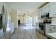 Bright kitchen with stainless steel appliances and an open view to other rooms at 165 Mcelwaney Way, Fayetteville, GA 30215
