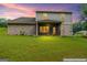 Spacious backyard with a relaxing screened-in porch, perfect for enjoying the outdoors at 132 Whitworth Dr # 15, Locust Grove, GA 30248