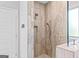 The bathroom boasts a tiled walk-in shower with rainfall shower head and built-in niche at 132 Whitworth Dr # 15, Locust Grove, GA 30248