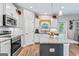 Bright kitchen with stainless steel appliances, granite countertops, and ample cabinet space at 132 Whitworth Dr # 15, Locust Grove, GA 30248
