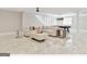 Finished basement with stylish L-shaped couch, pool table and glossy floor at 4203 Harrogate Nw Dr, Atlanta, GA 30327