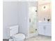 Contemporary bathroom with white vanity, glass shower door, and stylish lighting at 4203 Harrogate Nw Dr, Atlanta, GA 30327