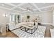 Spacious living room with coffered ceilings, modern decor, and a neutral color palette at 4203 Harrogate Nw Dr, Atlanta, GA 30327