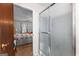 En suite bathroom featuring glass shower door and a glimpse of the cozy bedroom at 75 Antioch Rd, Mcdonough, GA 30252