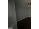Basement room with dark floors and a ceiling fan at 8427 Fredericksburg Ct, Jonesboro, GA 30238