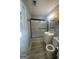 Bathroom featuring a shower-tub combination, white vanity, and updated fixtures at 8427 Fredericksburg Ct, Jonesboro, GA 30238