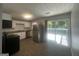 Bright, spacious kitchen equipped with stainless steel appliances and a sliding glass door to a deck at 8427 Fredericksburg Ct, Jonesboro, GA 30238