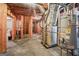 Unfinished basement featuring exposed ductwork, plumbing, and wooden framing at 3688 Eagles Beek Cir, Lithonia, GA 30038