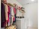 Laundry room featuring washer, dryer, and wire shelving for storage at 3688 Eagles Beek Cir, Lithonia, GA 30038