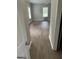 Bedroom with hardwood flooring, ceiling fan, and two windows at 871 Clearwater Rd, Sharpsburg, GA 30277