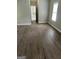 Spacious room with modern flooring, fresh paint, and natural light at 871 Clearwater Rd, Sharpsburg, GA 30277