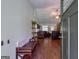 Inviting foyer with bench seating and views into the home's living spaces at 1828 Pitts Chapel Rd, Newborn, GA 30056