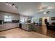 Bright kitchen with tile flooring, modern appliances, and ample counter space, ideal for cooking and entertaining at 1828 Pitts Chapel Rd, Newborn, GA 30056