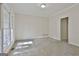 Neutral bedroom with large window and carpeted floors at 1202 Loxley Cir, Peachtree City, GA 30269