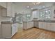 Modern kitchen featuring stainless steel appliances and granite countertops at 1202 Loxley Cir, Peachtree City, GA 30269