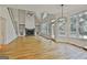 Bright living room featuring vaulted ceilings, built-in shelves, and a stone fireplace at 1202 Loxley Cir, Peachtree City, GA 30269