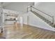 Open concept living area with hardwood floors connects to a bright kitchen at 1202 Loxley Cir, Peachtree City, GA 30269