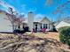 Spacious backyard featuring a patio seating area, perfect for outdoor enjoyment and relaxation at 486 Village Cir, Stockbridge, GA 30281
