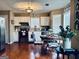 Charming kitchen with stainless steel appliances, wood floors and a cozy dining area at 486 Village Cir, Stockbridge, GA 30281