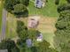 Aerial view of a house with mature trees, and green lawn, offering lots of privacy at 611 Bernhard Rd, Fayetteville, GA 30215