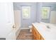 Bathroom features a tub/shower combo and a vanity with a sink at 611 Bernhard Rd, Fayetteville, GA 30215
