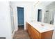 Bright bathroom with a double vanity, shower, and walk in closet at 611 Bernhard Rd, Fayetteville, GA 30215