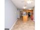 Charming kitchen features a central island, wooden cabinetry, and modern appliances at 611 Bernhard Rd, Fayetteville, GA 30215